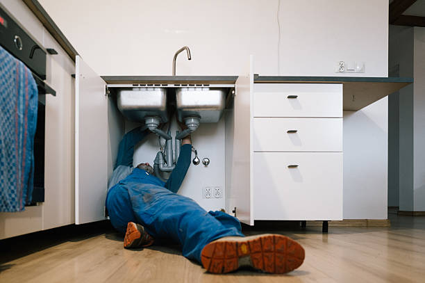 Professional Emergency Plumber technician working in DeForest, WI